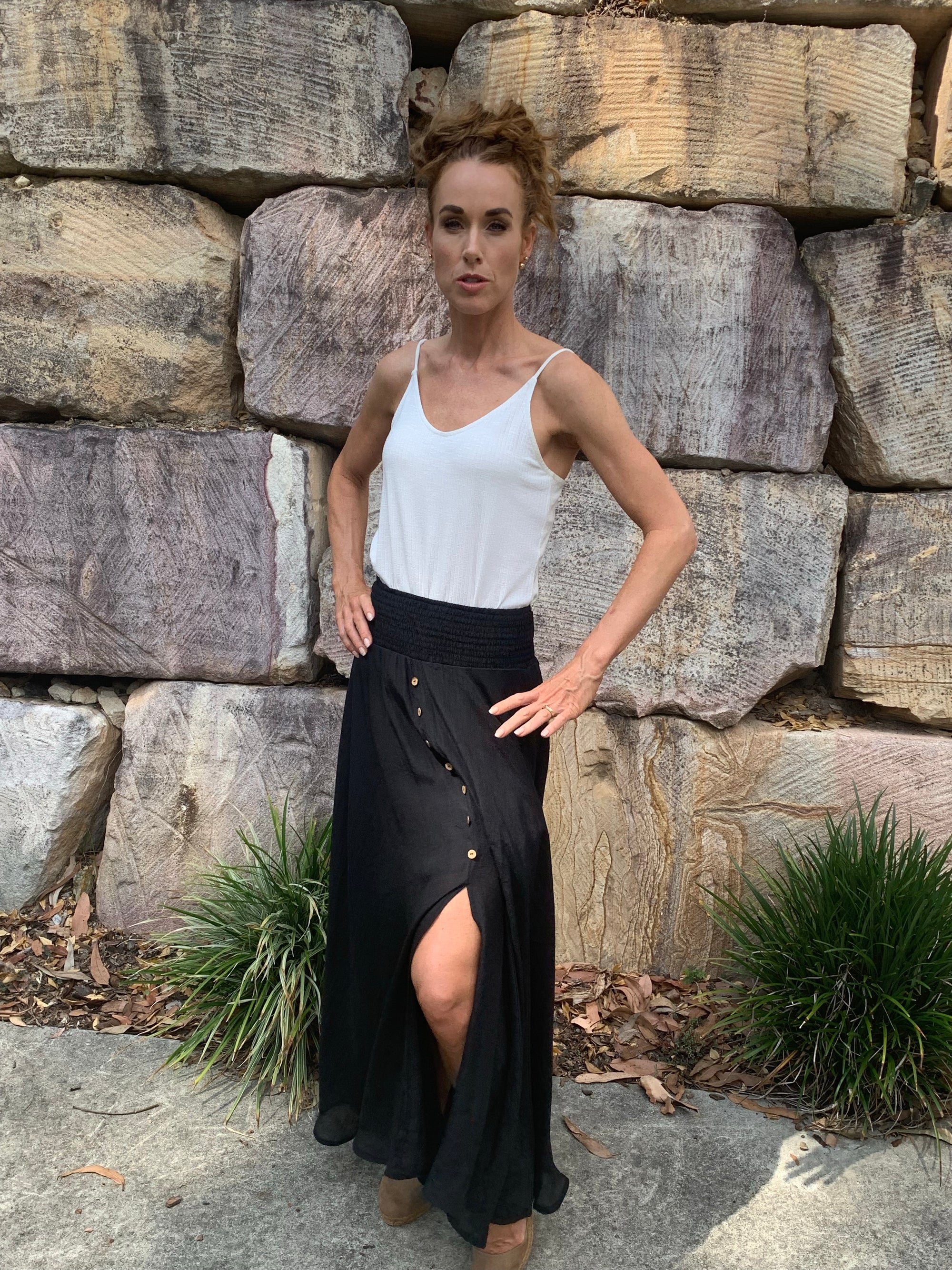 Long Black Maxi Skirt with Slit, Elastic Waist and Button Detail