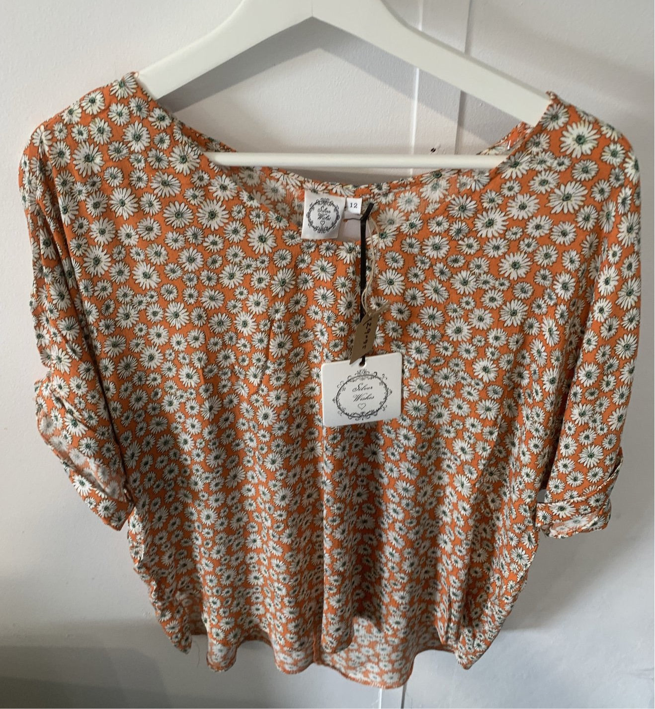 Orange Top with Daisy Print Short Cuffed Sleeves High Low Hemline - Silver Wishes